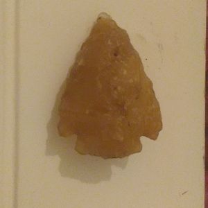 Very old seamonial quartz arrow head
